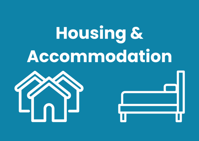 The image has a teal background. White text spells 'Housing & Accommodation'. Below are two white icons, on the left there are three houses, with one in the foreground, and on the right, and a bed.